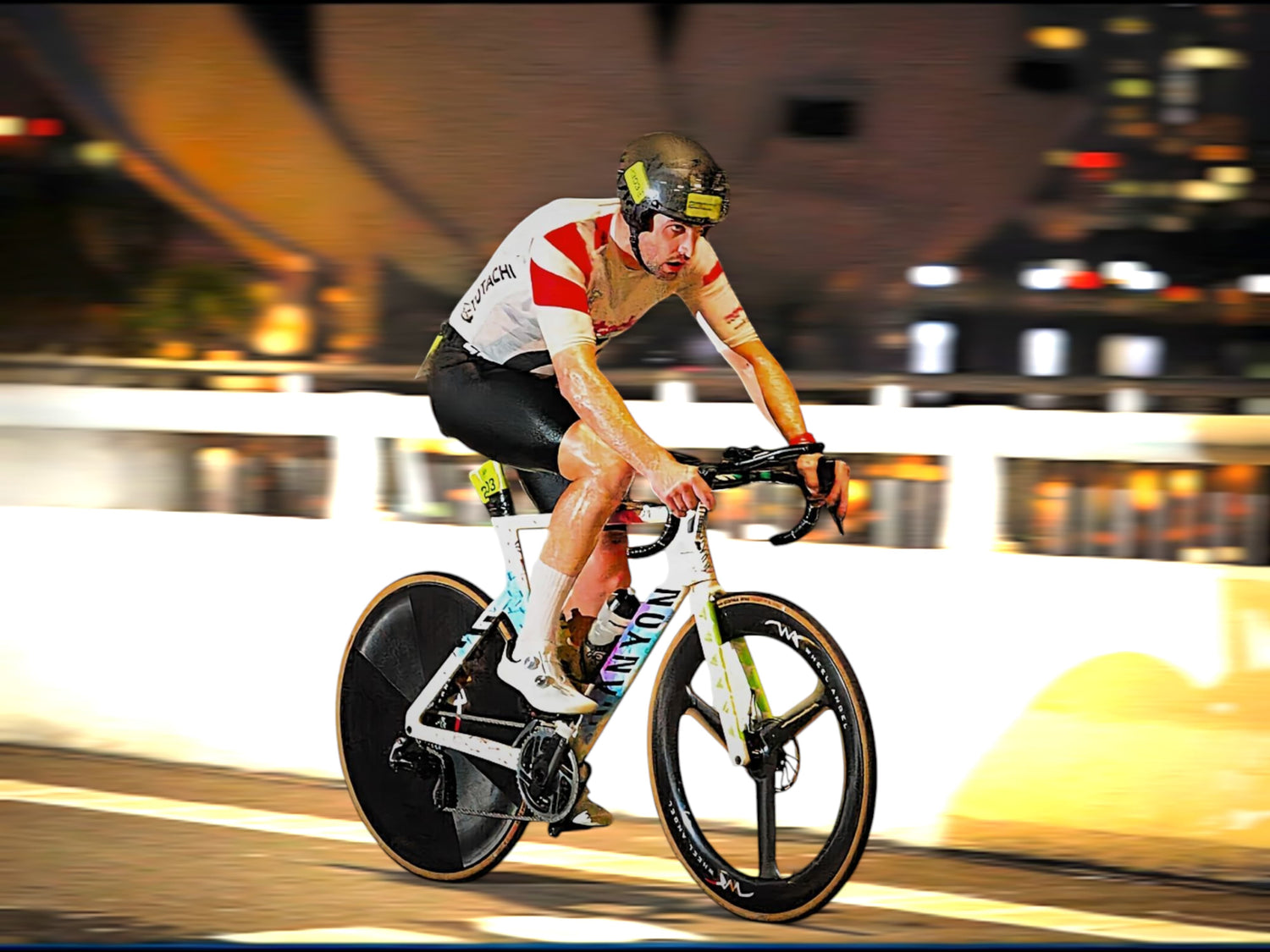 Aerodynamic Wheel Angel triathlon carbon rear full disc and front tri-spoke wheels set up for a T100 triathlon race
